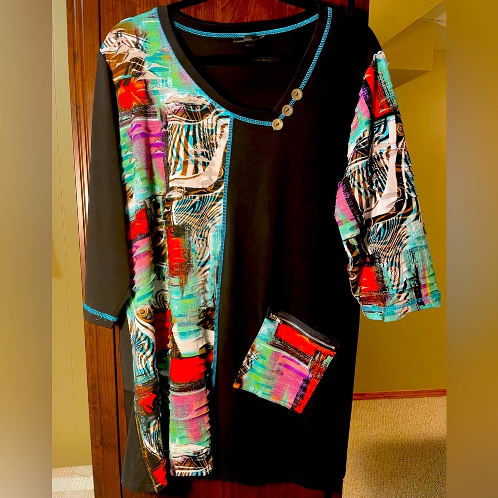 Tunic top with 3/4 length sleeves with solid black and prints in blocks